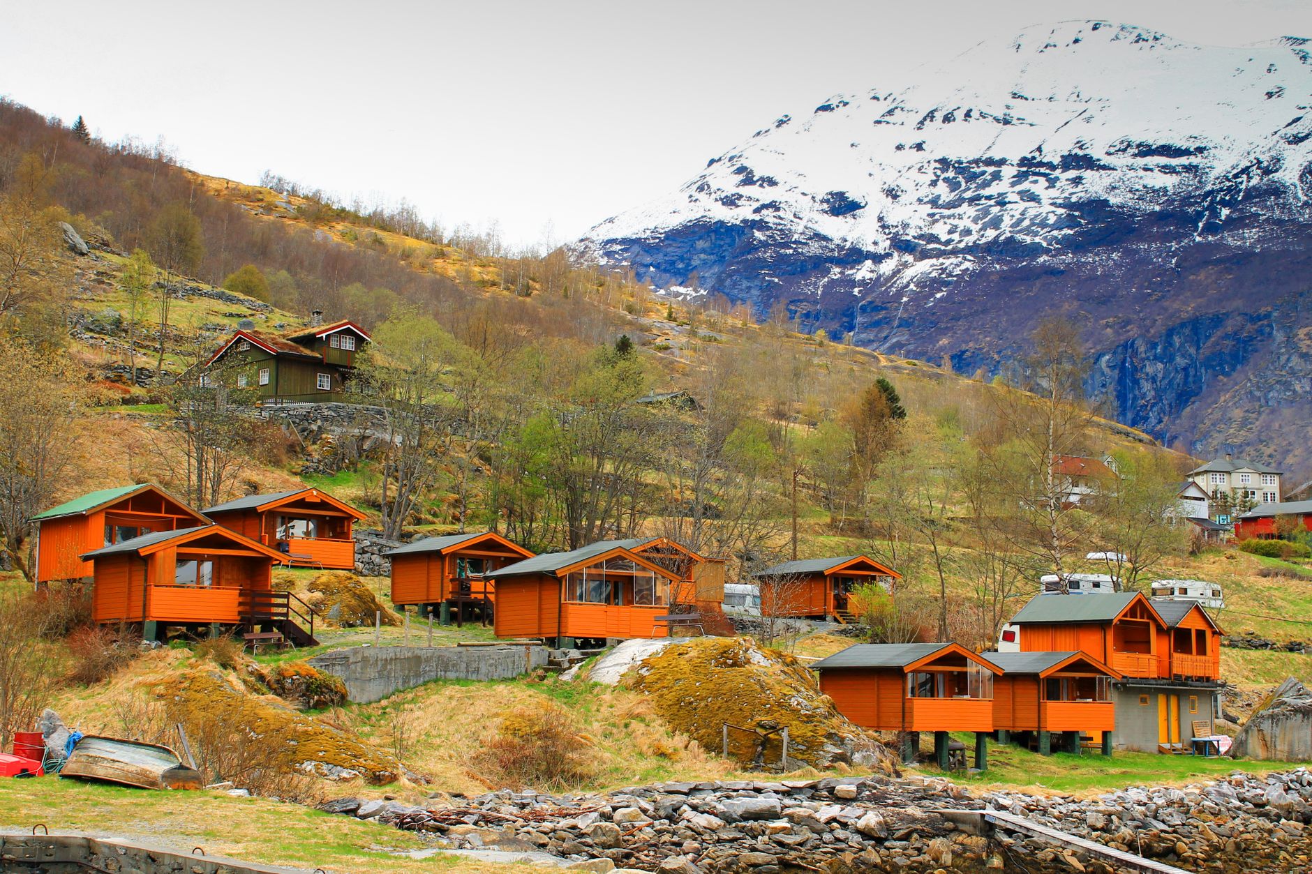 Norwegian fjord view with turquoise water and cliffside