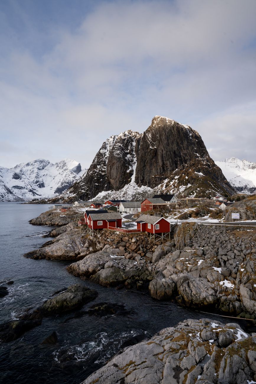 Red traditional rorbu fishing cabin on Norwegian coast